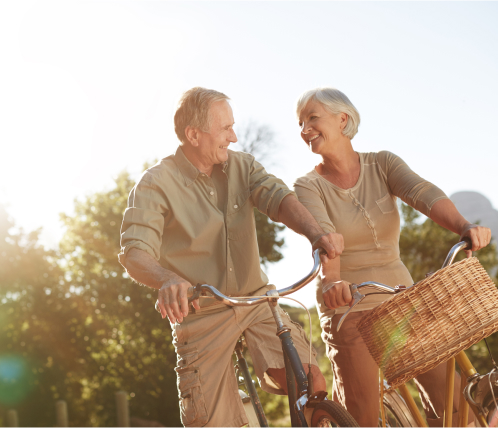 senior couple on bikes